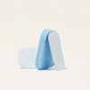 Three Pop-Up Sponges in blue, resembling a plant-based absorber, stand on a plain white background. The rectangular shapes with rounded edges vary slightly in shade and texture, providing an eco-friendly and plastic-free cleaning choice.